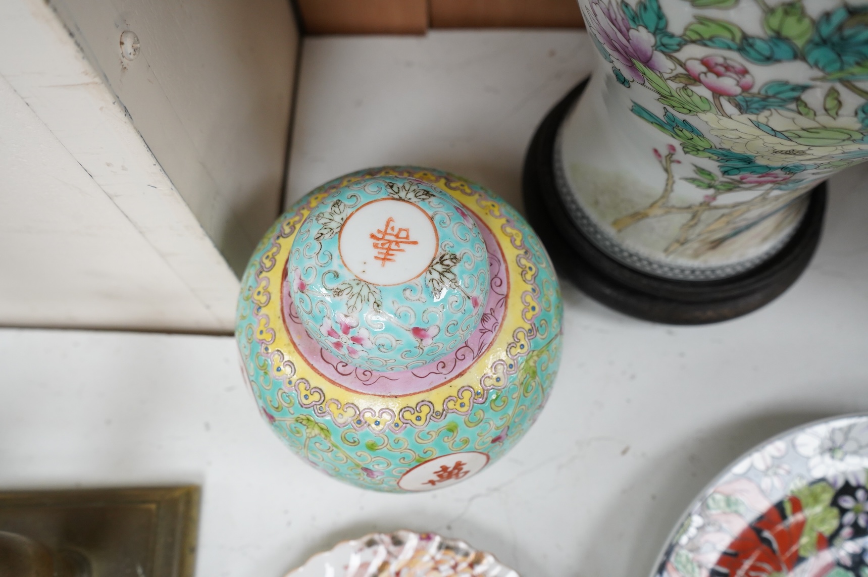 A collection of Chinese ceramics to include enamelled ginger jar and cover, floral plate and a vase, largest 40cm high